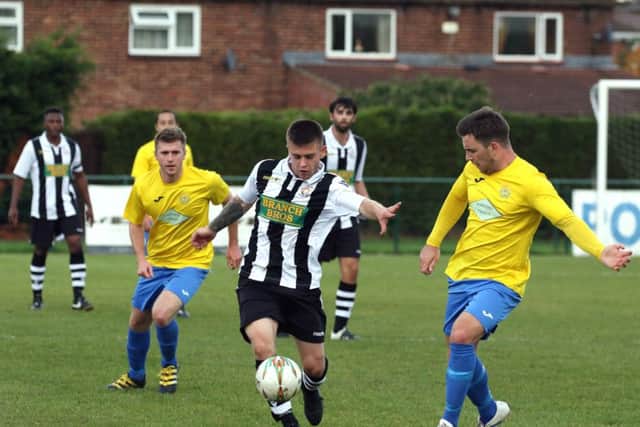 Harley Williams (stripes) scored for ICA Sports at Stilton.