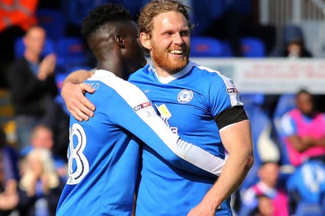 Craig Mackail-Smith (right) celebrates a goal for Posh against Bristol Rovers. Photo: Joe Dent/theposh.com.