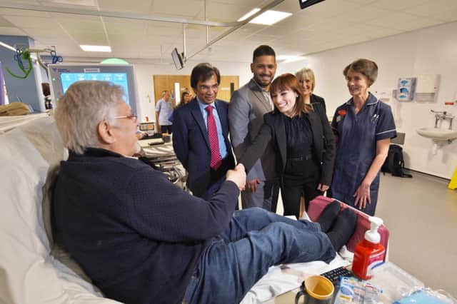 Staff and guests at the opening of the new Renal Service unit at Westwood Farm.  Dr Chandra Mistry with his son Jimmy Mistry, Flavia Cacae and Sister Christine Edwards talking tp patient Christopher Perry EMN-170426-170108009