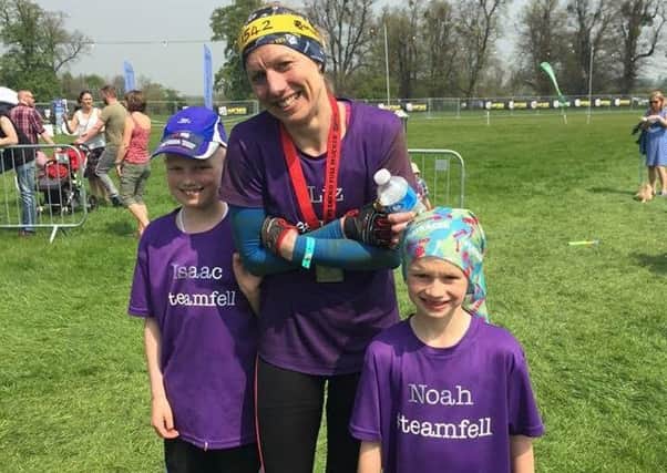 Liz with Isaac and Noah at the end of Rat Race 2016