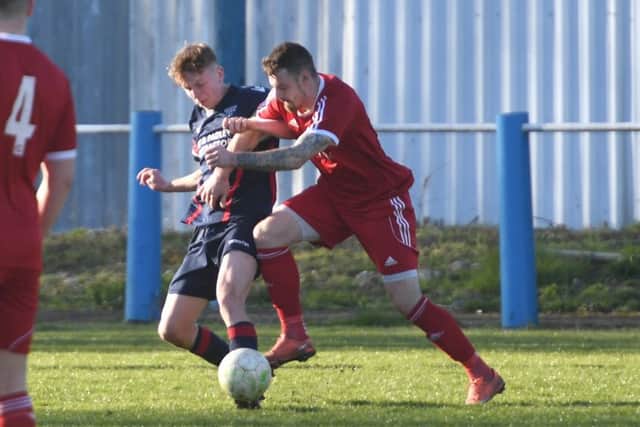 Josh Moreman (right) played for and scored for Peterborough Sports Reserves against Pinchbeck United.