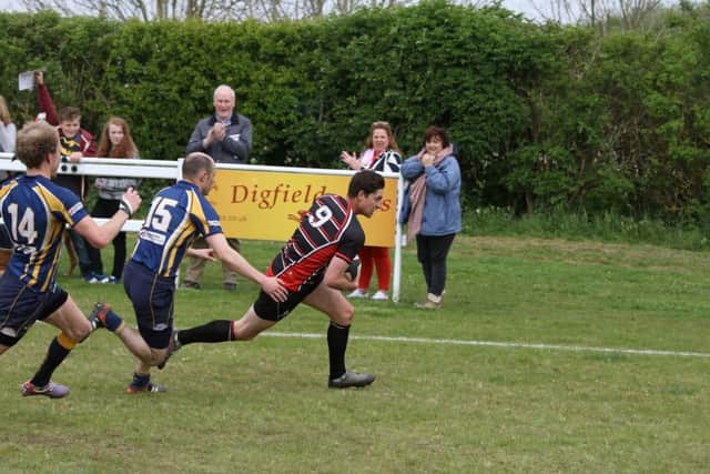 Scrum-half Jaco Steenberg nips in for an Oundle try. Picture: Mick Sutterby