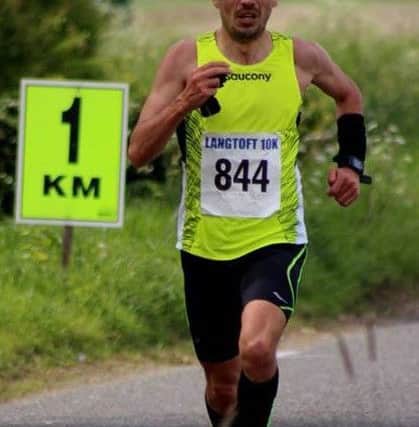 Aaron Scott on his way to victory in the Langtoft 10k. Picture: Kevin Hartley