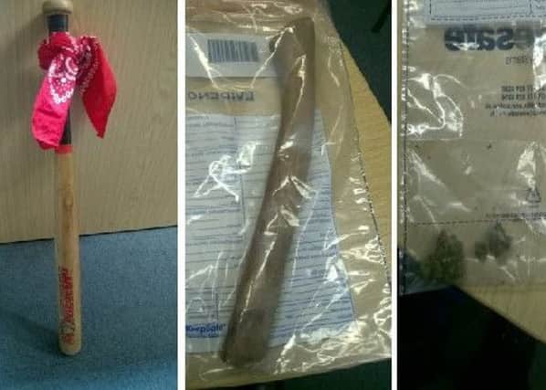 The weapons and drugs seized by police qMUk3lwZng-U9MgO8iwP
