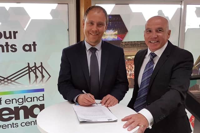 From left, Stuart Costello, head of marketing at Mick George and Ian Strange, commercial manager of the East of England Arena and Events Centre, agree the new sponsorship deal.