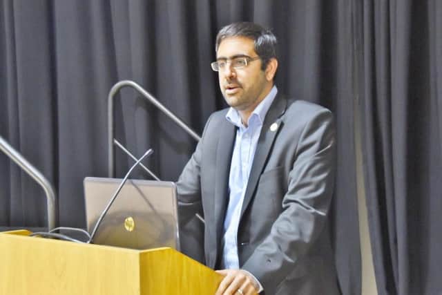 Miqdaad Versi speaking at the AGM