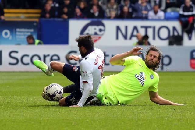 Michael Bostwick (yellow) was the subject of a bid from Sheffield United.