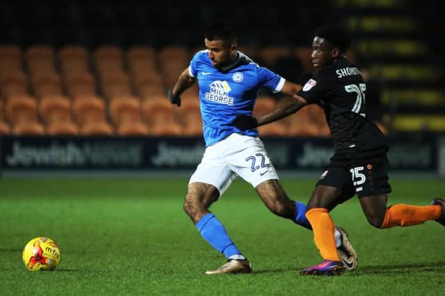 Adil Nabi (left) is on the Posh transfer list.