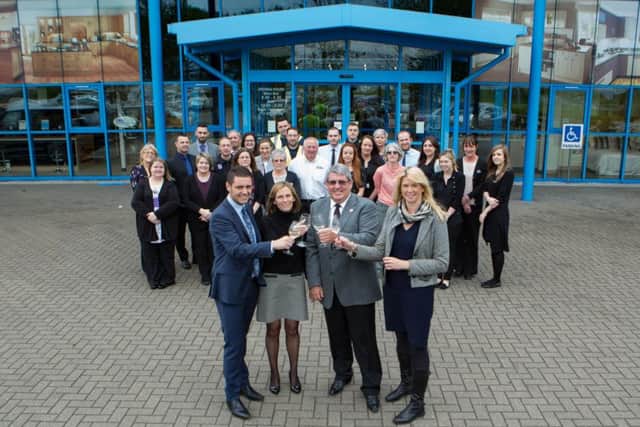 Premier Kitchens celebrate 25 Years., Pictured Shane Forsythe, Alison Forsythe and Iain Forsythe, Linda Betts and team.Hampton Showroom, Peterborough03/05/2017. Picture by Terry Harris / Peterborough Telegraph. THA