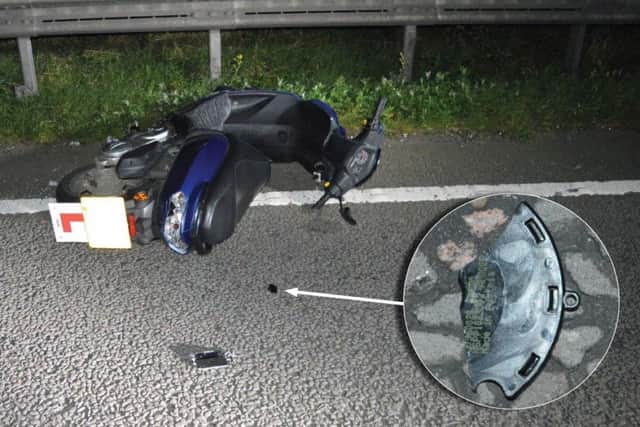 The scooter and the tiny part of plastic used to tie the incident to Wallace