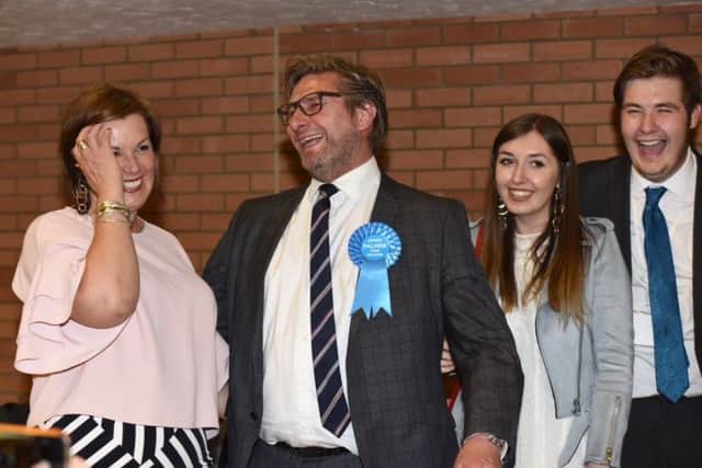 Newly elected Mayor of Cambridgeshire and Peterborough James Palmer celebrates with his family.