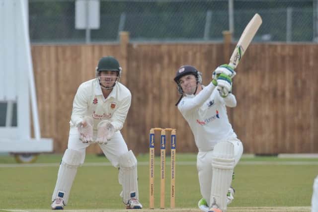 Lewis Bruce on his way to 49 for Peterborough Town against Oundle. Photo: David Lowndes.