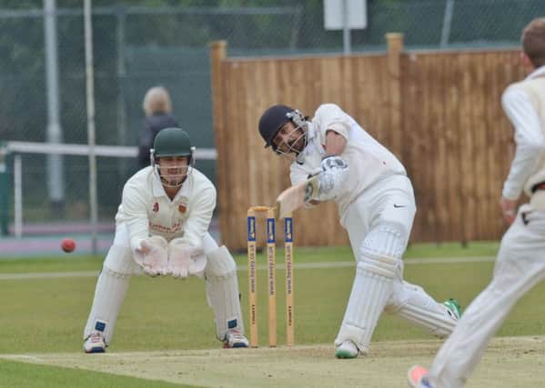 Asim Butt on his way to a superb 119 for Peterborough Town against Oundle. Photo: David Lowndes.