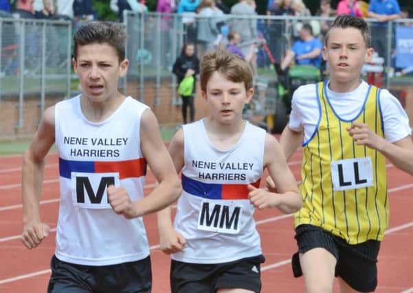 Kai Chivers and Freddie House in action for Nene Valley Harriers in the under 13 boys 800m race at the Embankment. Photo: David Lowndes.