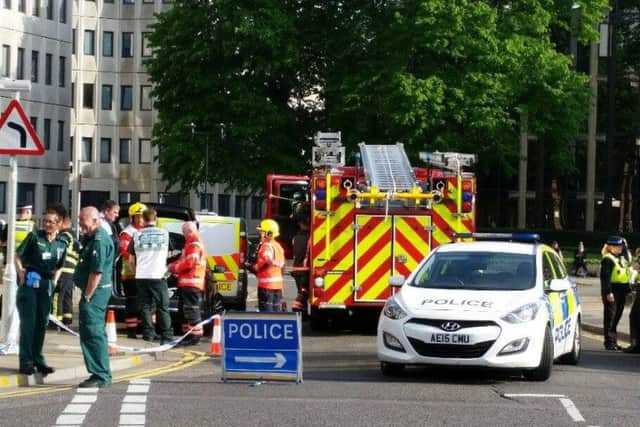 The scene outside the passport office in Peterborough following the security alert. Photo: Ricke Williams