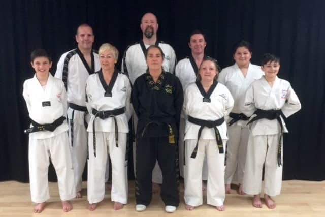 Successful studentsthe left were Luke Fardy 1st Dan, Andy Bowen 3rd Dan, Mandy Thorpe 4th Dan, Peter White 4th Dan, Annabel Murcott 7th Dan, Neil Harradine 3rd Dan, Clare Brown 3rd Dan, Saffron Roly 1st Dan and Daniel Roly 1st Dan.