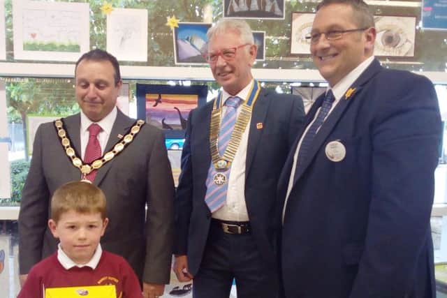 Charlie Doud with Mayor of Market Deeping councillor Wayne Lester, Rotary Club president Carl Midgley and Martin Reece, manager of Market Deeping Tesco.