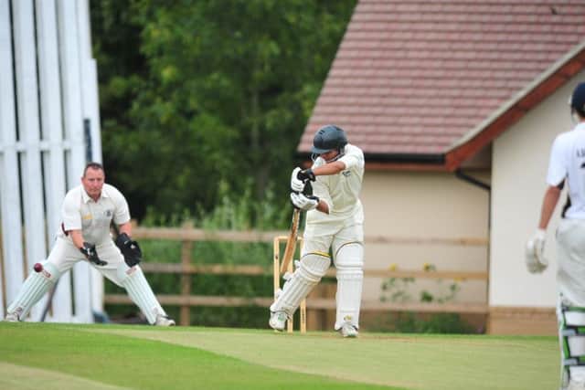 Faisal Javed scored 46 of Spalding's 95 at Lincoln.