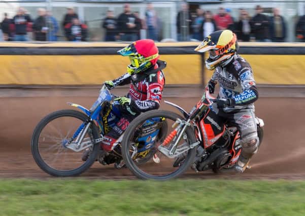 Paul Starke of Panthers holds off Newcastle's Ash Morris. Photo: Diana Jones.