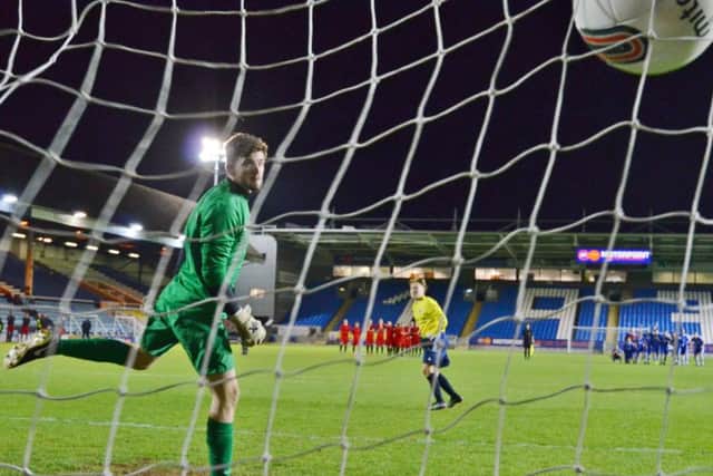 The winning penalty from ICA goalkeeper Adam Mills hits the back of the net. Photo: David Lowndes.