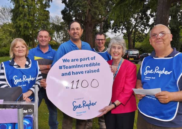 Hazel Sibthorpe from Sue Ryder Care receives a cheque for Â£1,100 from members of the Peterborough and District Anglers Association following their match at Ferry Meadows.Also pictured are  Robina Smith, Paul Hudson, Simon Farmer, Jonathan Means and Mike Smith.
