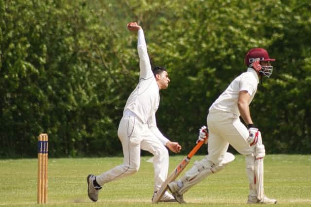 Abrar Ahmed bowling for Werrington at Isham. Photo: @idesignandpublish.com.