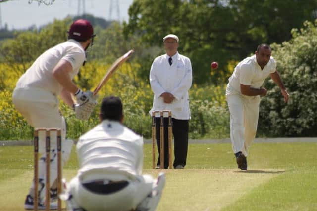 Mukhtar Ahmed bowling for Werrington at Isham. Photo: @idesignandpublish.com