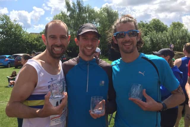 Peterborough Athletic Club's winning team at the Eye 10k. They are from the left James Sadlier, Ben Heron and Kirk Brawn.