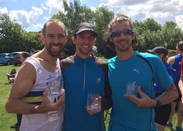 Peterborough Athletic Club's winning team at the Eye 10k. They are from the left  James Sadlier, Ben Heron and Kirk Brawn.