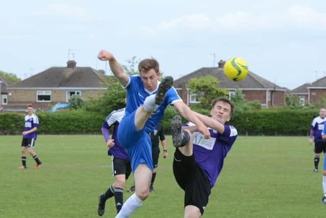 Action from the Peterborough League Division Two match between AFC Stanground Sports Reserves and Whittlesey Athletic A. Photo: David Lowndes.