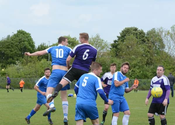 Action from AFC Stanground Sports Reserves (purple) v Whittlesey Athletic A. Photo: David Lowndes.