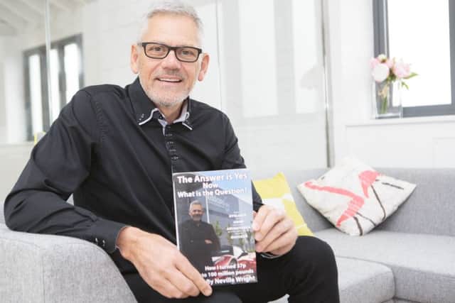 Neville Wright with his new book.  
Picture by Terry Harris / Peterborough Telegraph. THA