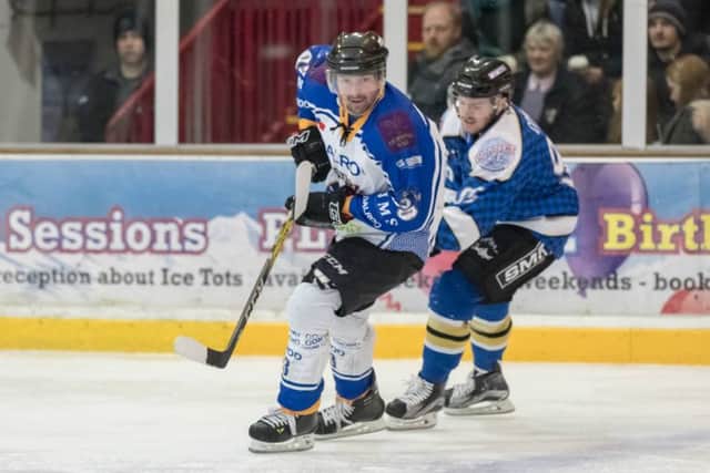 Ales Padelek fends off Jordan Cownie of MK Lightning. Picture: Tom Scott