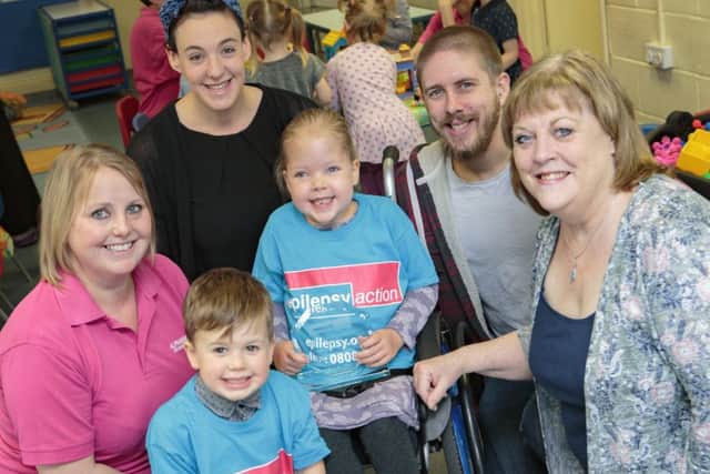 Backrow, l-r, Kerry Hustler (Alphabet Nursery), Fay Ratcliffe (mum), (dad), June Massey (Epilepsy Action. Front row, l-r, Max Ratcliffe (brother, 3), Maya Ratcliffe THA