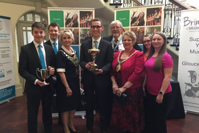 The award winners with their silverware.