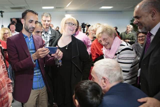 Jeremy Corbyn in Peterborough with Hasnain Nawaz aged 9. Picture by Terry Harris / Peterborough Telegraph. THA