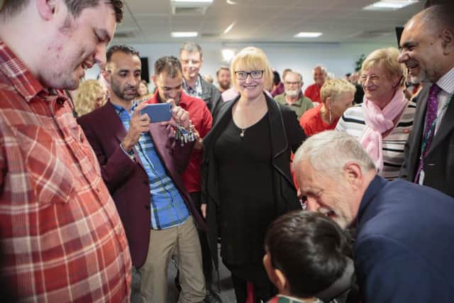 Jeremy Corbyn in Peterborough with Hasnain Nawaz aged 9.  Picture by Terry Harris / Peterborough Telegraph. THA