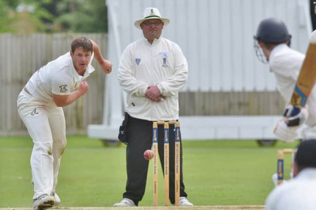 Joe Dawborn in action during a spell of 6-29 for Peterborough Town against Horton House. Photo: David Lowndes.