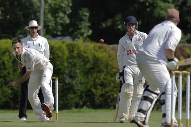 Chris Ringham picked up two wickets for March at Godmanchester.