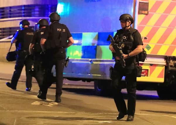 Armed police.  Peter Byrne/PA Wire