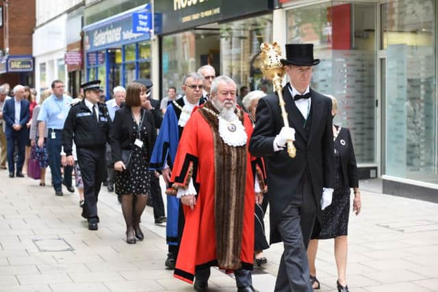 Civic procession and one minute vigil on Cathedral Square EMN-170523-135005009