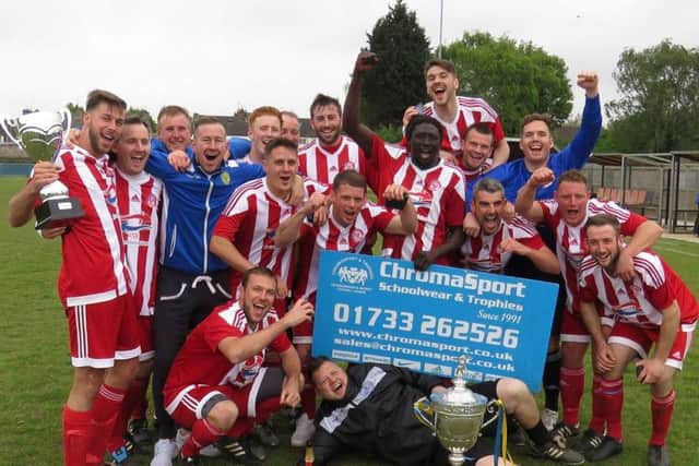 Peterborough Sports Reserves celebrate their Peterborough Premier Division title success. Manager Andrew Bradley is third from the left in the middle row.
