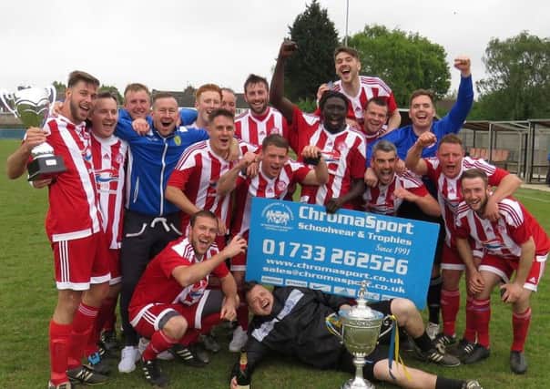 Peterborough Sports Reserves celebrate their Peterborough Premier Division title success. Manager Andrew Bradley is third from the left in the middle row.