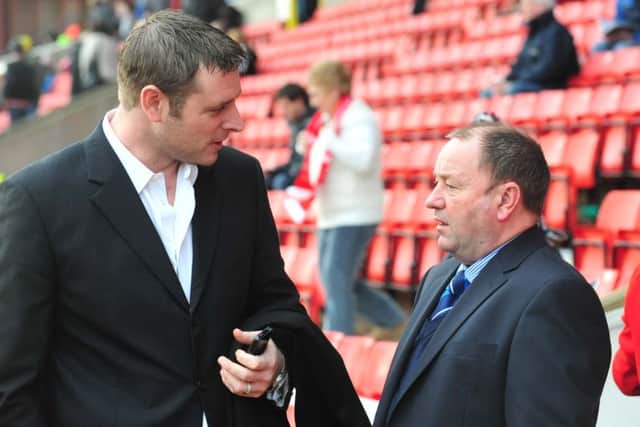 Former Posh boss Gary Johnson (right) with chairman Darragh MacAnthony.