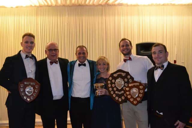 Pictured are ,from the left, Joe Andresen, Dick Clark, vice-chairman Archie Bennett, Margery Beuttell, Sarel Pretorius and Aaron Throne.
