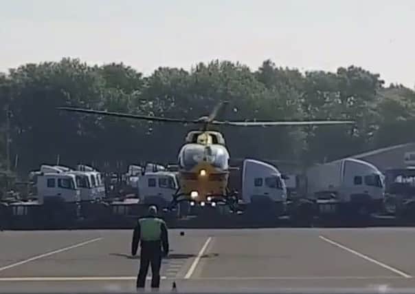 The East of England Air Ambulance landing in Peterborough this morning