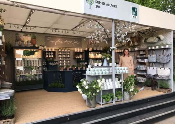 Sophie Allport on her display stand at the Chelsea Flower Show.