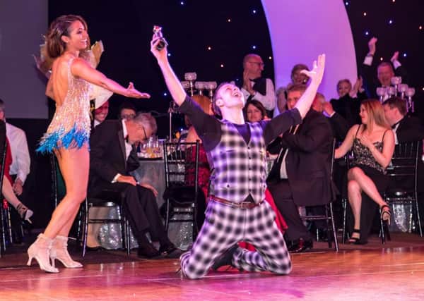Strictly Come Dancing's Keven and Karen Clifton in action on the dance floor after Kevin is presented with his award.