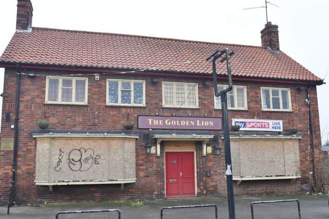 The former Golden Lion pub at Stanground. EMN-170131-134451009