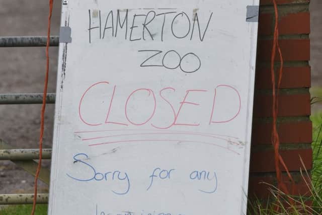 A hastily prepared sign at Hamerton Zoo park where a fatal tiger attack took place